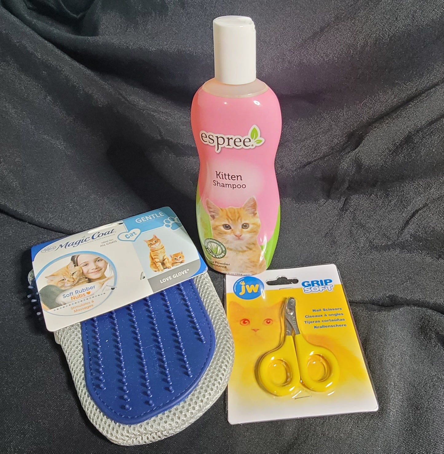 Kitten grooming kit comes with Espree kitten shampoo, nail trimmers and magic coat hand mitt.