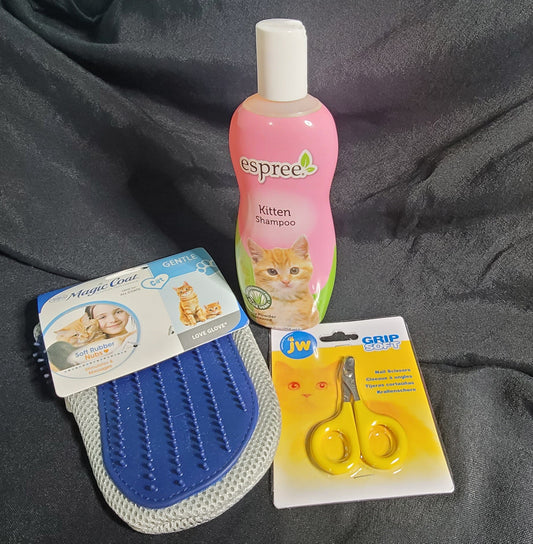 Kitten grooming kit comes with Espree kitten shampoo, nail trimmers and magic coat hand mitt.
