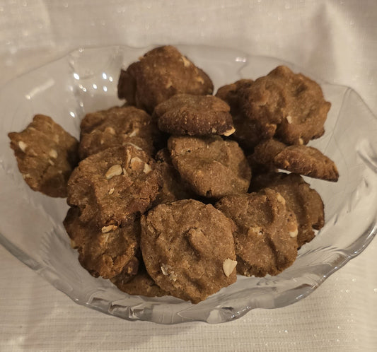 Healthy and delicious peanut butter dog cookies created in a home kitchen made for dogs of all kinds. Always made with real ingredients, no artificial flavors here.